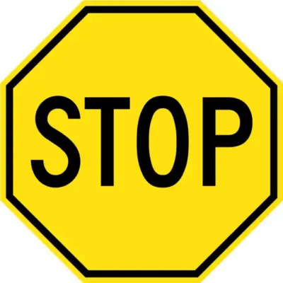 Uzlīme STOP zīme dzeltena